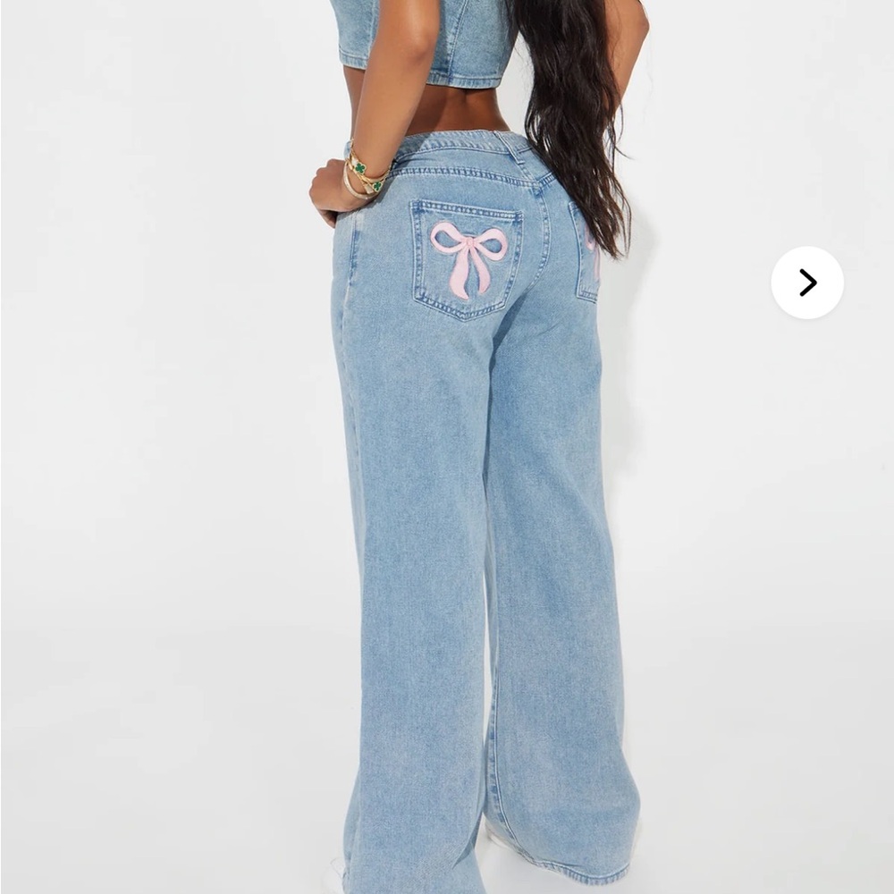 Stylish Blue Jeans with Pink Bow Detail